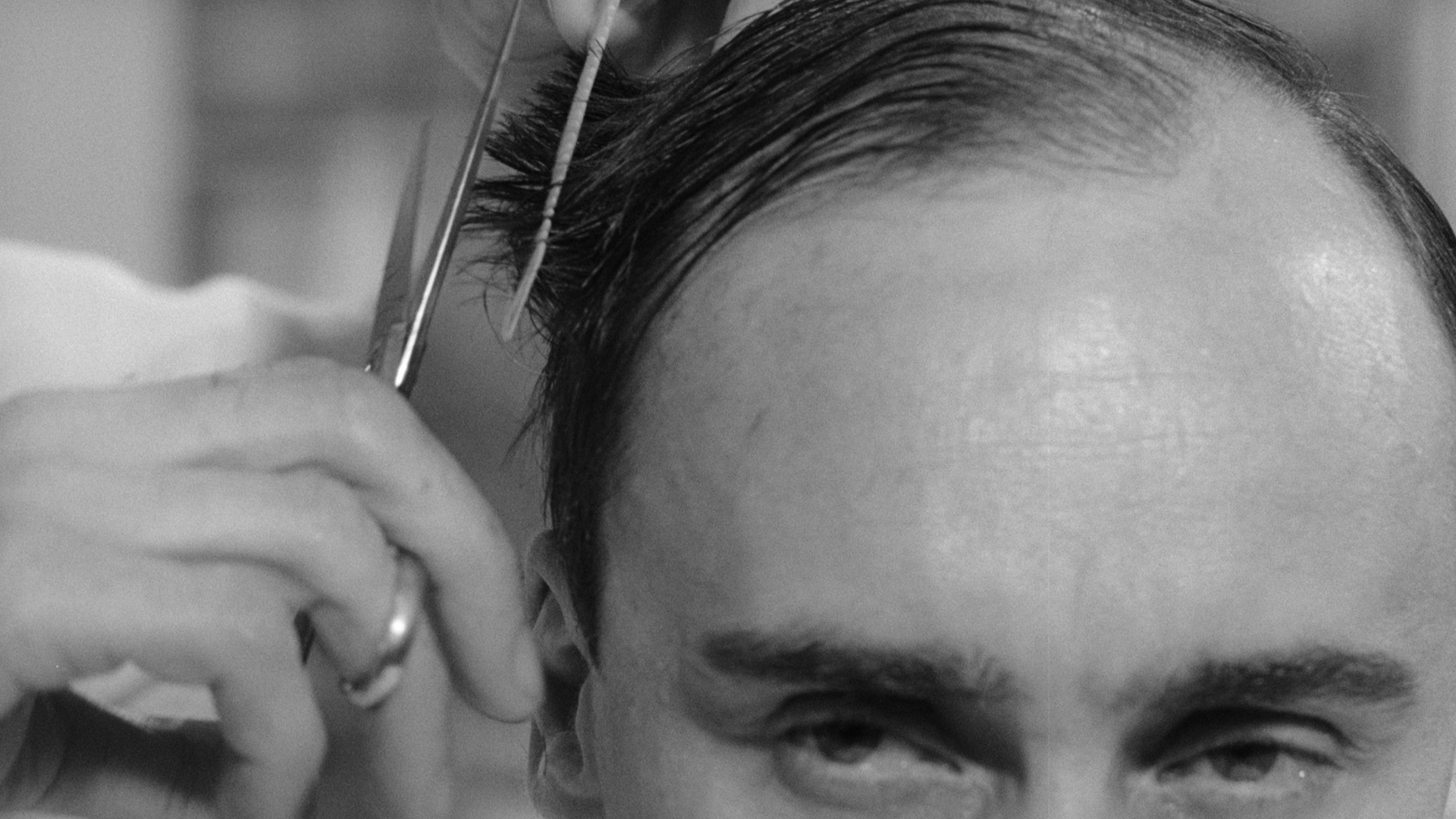 The Man Who Had His Hair Cut Short slide 0